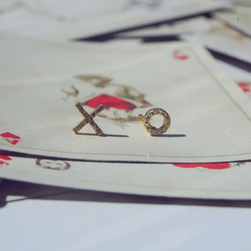 Diamond & Yellow Gold XO Studs